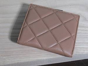 lot 38 image: Accessory Street Small Quilted Leather Zip Wallet, Beige