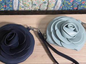 lot 43 image: Kate & Mallory Faux Leather 3D Flower Applique Coin Purse, Set of 2-Navy & Turquoise
