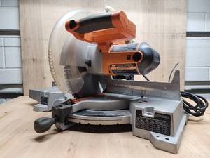 lot 107 image: Ridgid 12in. Compound Miter Saw