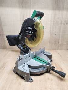lot 104 image: Hitachi 10 Laser Miter Saw