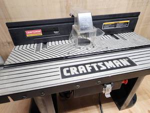 lot 63 image: Craftsman Benchtop Router Stand with Router