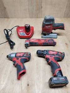 lot 64 image: Assorted Milwaukee Cordless Tools with Charging Station