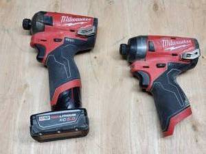 lot 179 image: Assorted Milwaukee Cordless Tools with Charging Station