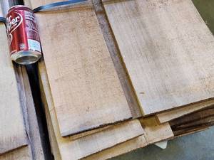 lot 209 image: (2) Stacks of Cedar Siding