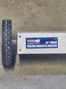 lot 197 image: Grip 30 in. Jumbo Rolling Magnetic Floor Sweeper