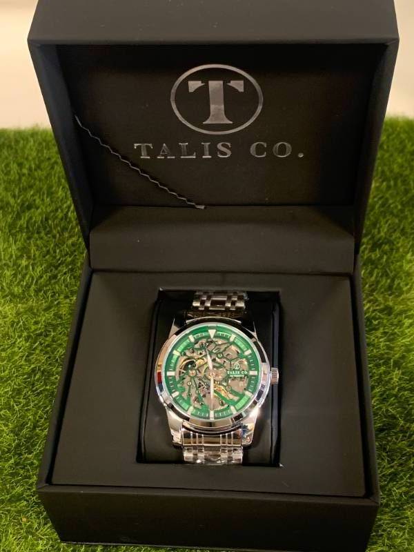 lot 14 image: New Talis Co. 7820 Automatic Watch $686 retail