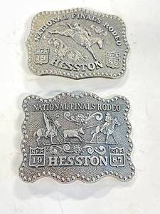 lot 27 image: 1986 & 1987 Hesston Rodeo Finals Belt Buckles