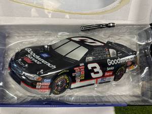 lot 34 image: New 2002 Heavy Metal NASCAR Wall Hanging 19 Inch Long