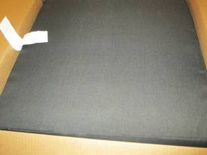 2 black chair cushions ...