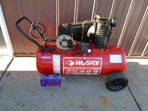 lot 102 image: Husky belt driven air compressor. Nice shape. 120 volt. Tested & works. As shown.