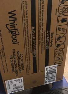 lot 49 image: Whirlpool  24 Stainless Microwave  Unused