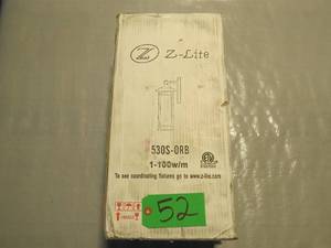lot 52 image: Z-Lite Woodland 16 1 Light Wall Sconce Oil Rubbed Bronze Unused