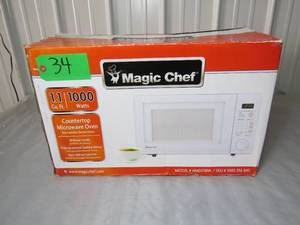 lot 34 image: Magic Chef 1.1 Cu.Ft. Microwave 1000 Watt