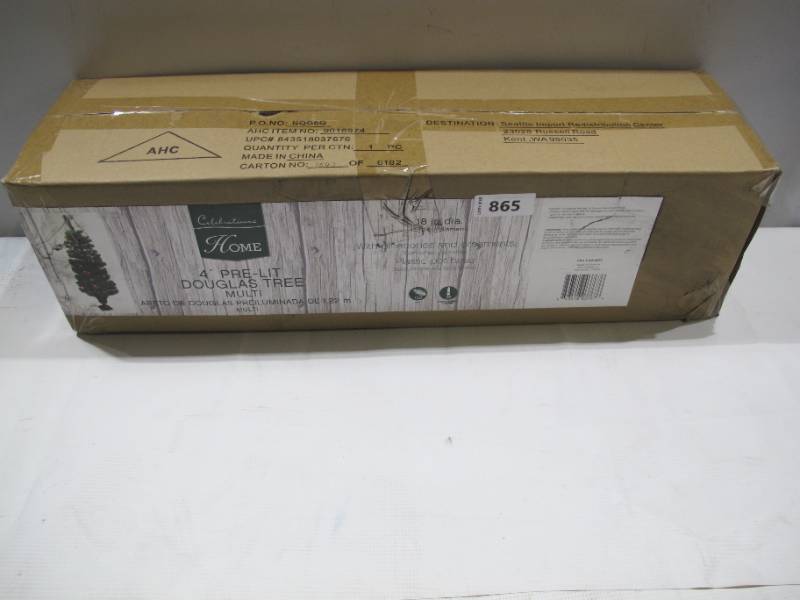 lot 865 image: NEW Celebrations Home 4 ft. Potted Douglas Fir Prelit 35 count Artificial Tree - Multi-Color