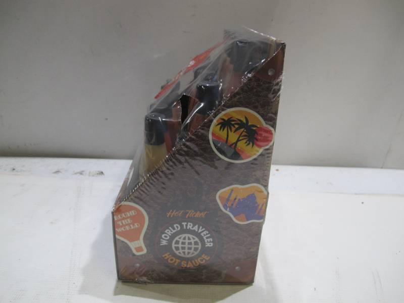 lot 666 image: World Traveler 15 Bottle Hot Sauce Set - NEW