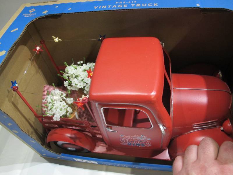 lot 668 image: Members Mark Pre-Lit Freedom Ring Red Vintage Truck