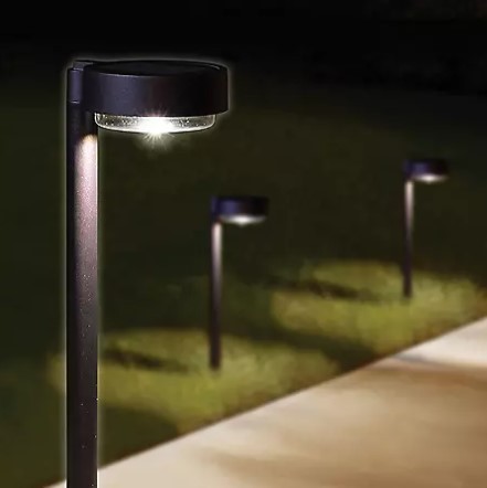 lot 717 image: Members Mark 4-Piece LED Solar Pathway Downlights, Oil-Rubbed Bronze