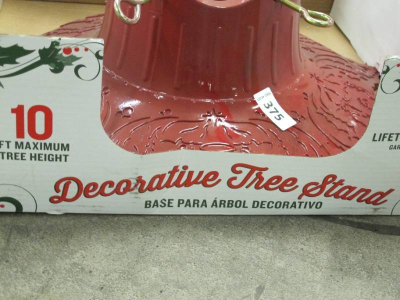 lot 744 image: NEW  Red Cast Iron Powder Coated Real Christmas Holiday Tree Stand for 10 Trees