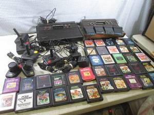 lot 31 image: (F-1) 2 Atari Game Consoles (One ha...