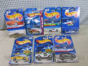 lot 230 image: (EC1) Assorted Hot Wheels in Packag...