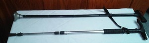 lot 47 image: (2) Adjustable Canes, one with a headlight.