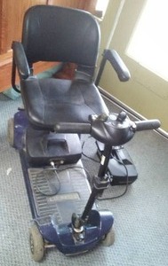 lot 27A image: Pride Mobility Products GO GO Ultra X Scooter.