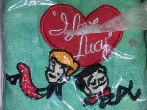 lot 93 image: I Love Lucy Slippers. 11 Inches Long.