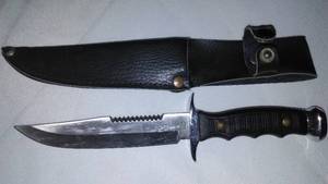 lot 187 image: 8.5 Inch Hunting Knife With Vinyl Sheath