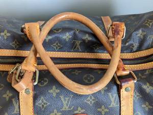 lot 32 image: Louis Vuitton Monogram Duffel Bag
