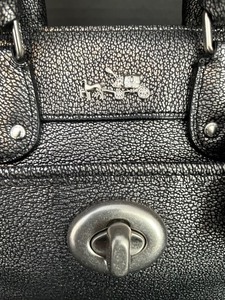 lot 163 image: Coach Black and Silver Shimmer Handbag with Dust Bag