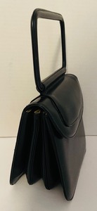 lot 338 image: Vintage Genuine Leather Handbag by Supreme