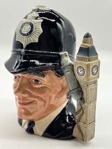 lot 244 image: Royal Doulton Toby Mug The London Bobby