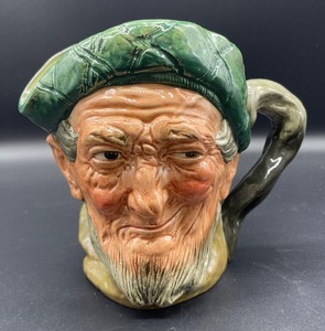 lot 396 image: Two Royal Doulton Auld Mac and Beefeaters Toby Mugs