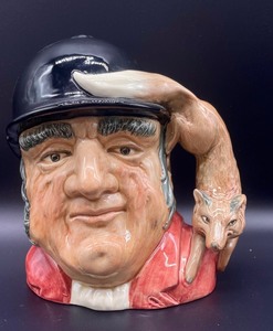 lot 409 image: Royal Doulton Gone Away and The The Trapper Toby Mugs