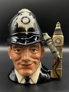 lot 400 image: Royal Doulton The London Bobby and Mr.Pickwick Toby Mugs