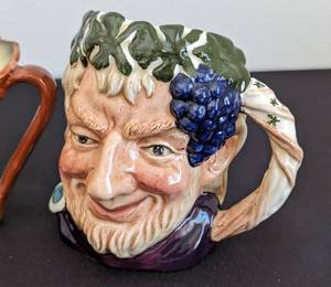 lot 299 image: Four Royal Doulton Character Mugs
