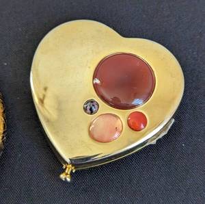 lot 505 image: Three Este Lauder Pressed Powder Compacts