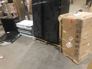 lot 4 image: Lot of assorted salvage garage cabinets please review pictures carefully damaged customer returns