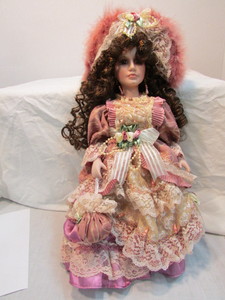 lot 24 image: Collectable Doll