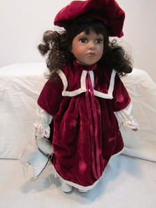 lot 49 image: Collectable Doll