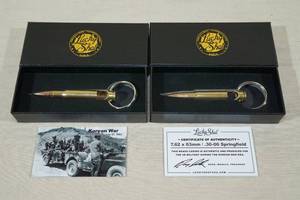 lot 93 image: 2 Lucky Shot Key Chain Bottle Openers - Korean War Era Casings