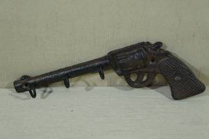 lot 97 image: Cast Revolver Key Hanger