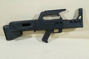 lot 41 image: Muzzelite Bullpup Rifle Stock for Ruger 1022 Rifle