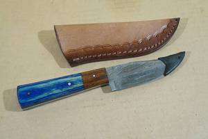 lot 73 image: Custom Damascus Style Hunting Knife with Blue Mahoe Wood Handle