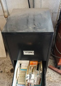 lot 15 image: Two-Drawer File Cabinet with Multiple Decks of Cards
