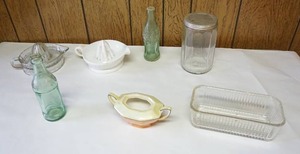 lot 123 image: Vintage Covered Coffee Jar, Bottles St.CloudMinneapolis, AnchorHocking Glass Cake Pan, Milk Glass & Clear Citrus Juicers Etc.