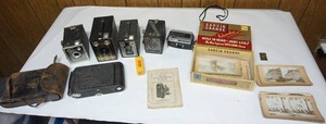 lot 142 image: The Photographers LotAntique Cameras, Stereoscope Photos Etc.
