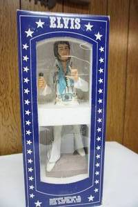 lot 143 image: 1977 ELVIS PRESLEY WHISKEY DECANTER - MADE BY MCCORMICK DISTILLING CO. - MIB