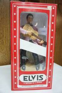 lot 144 image: 1977 Elvis Presley Yours Elvis 55 McCormick Small Whiskey Decanter Music Box