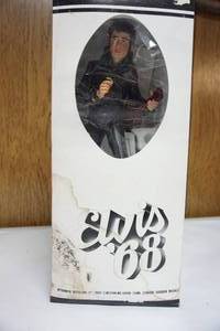 lot 145 image: Vintage 1977 Elvis Presley 68 Music Box Decanter by McCormick